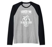 Tócame y tu Primera lección de Hapkido es Gratis Camiseta Manga Raglan