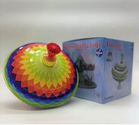 Toupi de juguete musical multicolor coral para niños de ksmtoys Bolz. El divertido zumbido coral se vuelve más fuerte a medida que la parte superior gira más rápido a partir de 18 meses
