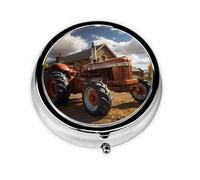Tractor rojo. Este pequeño pastillero redondo impreso es un organizador portátil de pastillas y vitaminas perfecto para bolsillos, bolsos y viajes.