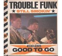 TROUBLE FUNK - STILL SMOKIN' 12" SINGLE UK 4TH AND BROADWAY 1986 3 TRACK HUG A BUT B/W RADIO AND THE BEAT IS BAD (12GOGO5) PIC SLEEVE