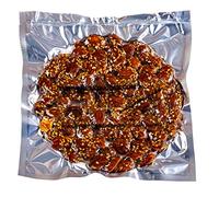 Turrón de guirlache en formato torta de 200g, también conocido como Turronico. Los principales ingredientes de este turrón son la almendra y la miel, se añaden una semillas de sésamo