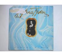 Tyson, Sylvia Woman's World LP EMI EST11434 EX/VG 1975 Sleeve has heavy sticker damage on front (6cm x 12cm) and on rear (4cm x 6cm). Sleeve is snipped at top left corner. There is factory sample sticker on side two label.
