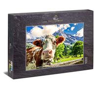 Ulmer Puzzleschmiede - Puzzle Vacas y montañas: Puzzle de 1000 Piezas - Una Curiosa Vaca Frente a un Paisaje montañoso de ensueño en los Alpes