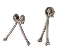 Un par de cascanueces de hierro fundido con forma de calavera. réplica diseño re