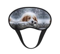 Un perro dormido, cómodo antifaz de satén con borde negro para bloquear la luz y dormir reparador