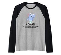 Un refrán Genial Un Viaje de mil Millas Camiseta Manga Raglan