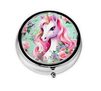 Unicornio rosa. Este pequeño pastillero redondo impreso es un organizador portátil de píldoras y vitaminas, perfecto para bolsillos, bolsos y viajes.