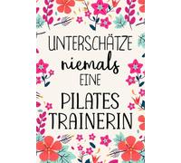 Unterschätze niemals eine Pilatestrainerin: Notizbuch mit linierten Seiten - Pilates Trainer Geschenk für Frauen