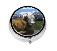 Vaca de animales de granja. Este pequeño pastillero redondo impreso es un organizador portátil de píldoras y vitaminas, perfecto para bolsillos, bolsos y viajes.