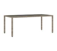 vidaXL Mesa de jardín con superficie de vidrio, ratán PE, gris 190x90x75 cm