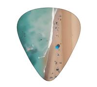 Vista aérea del juego de 12 púas de guitarra de playa, 3 grosores para guitarra acústica, bajo, guitarra eléctrica y mucho más.