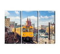 WALLERO Cuadro en Lienzo en Varias Partes Tren amarillo en Berlín sobre las vías - Decoración Mural Moderna e Impresión Artística | Cuadro para Salón, Dormitorio, Cocina, Recibidor 180x120