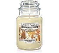Yankee Candle Brillante Navidad - Tarro grande - Calienta las vacaciones con un acogedor abrazo de vainilla cremosa y ámbar suave