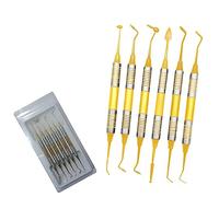 YNR 6 piezas de instrumentos de colocación compuestos antiadherentes para relleno restaurador dental con revestimiento de titanio dorado CE